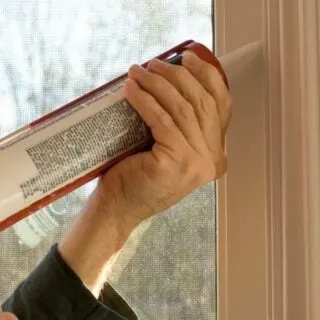 Can you caulk over old caulk